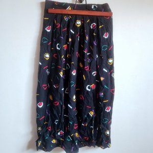 Black and multicolor abstract 1980s midi flowy skirt, elastic waist, womens sz S